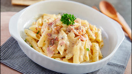 Fettuccini con judías blancas, rúcula y zanahorias